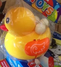 Игрушка Утка заводная  11х9.5х9 см (сбрасывает  яйца) в  пакете