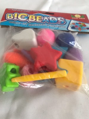 Игрушка Погремушка Шнуровка сборная в пакете 19х18х4 см